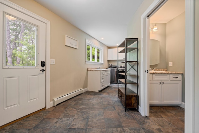 271 Red Gate Ln, Acton, ME 04001 - foyer entrance featuring a baseboard heating unit, stone finish floors, and recessed lighting
