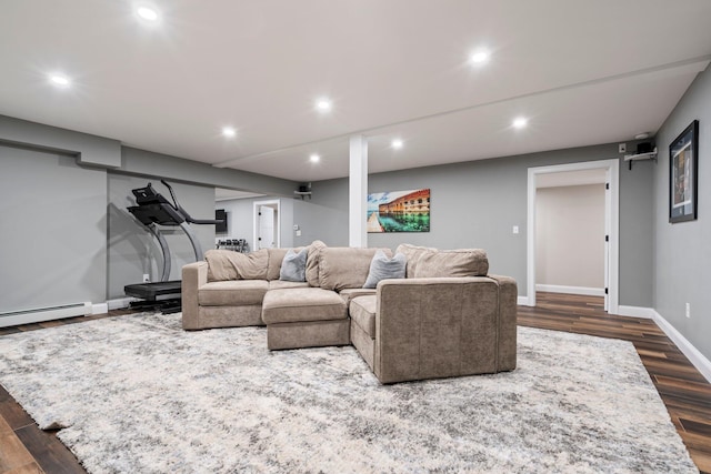 271 Red Gate Ln, Acton, ME 04001 - living area featuring dark wood finished floors, recessed lighting, and a baseboard radiator