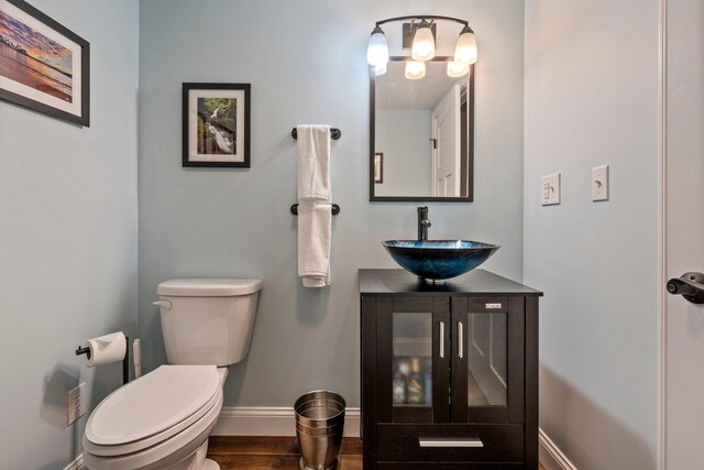 271 Red Gate Ln, Acton, ME 04001 - bathroom with vanity and wood finished floors