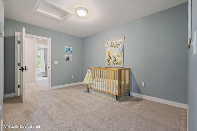 271 Red Gate Ln, Acton, ME 04001 - bedroom featuring attic access, carpet, a nursery area, and a baseboard radiator