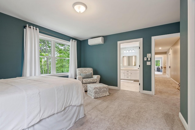 271 Red Gate Ln, Acton, ME 04001 - bedroom with a wall unit AC, multiple windows, light carpet, and ensuite bathroom