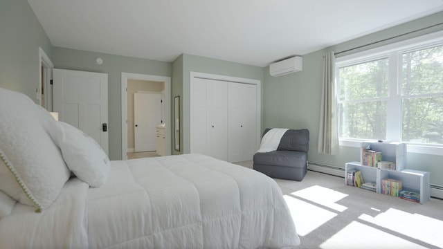 271 Red Gate Ln, Acton, ME 04001 - carpeted bedroom featuring a wall mounted AC, baseboard heating, and a closet