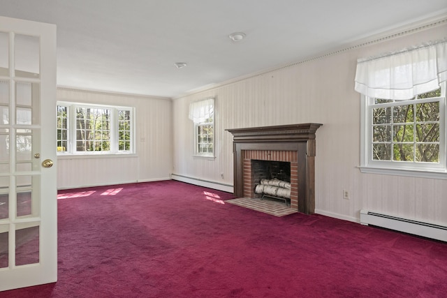 unfurnished living room with a fireplace, carpet flooring, crown molding, and a baseboard radiator