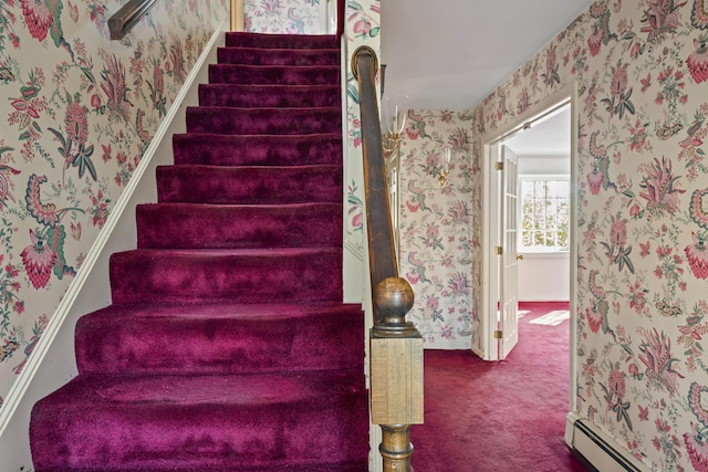 stairs with baseboards, a baseboard heating unit, wallpapered walls, and carpet flooring