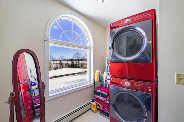 washroom featuring laundry area, stacked washer / dryer, and light tile patterned flooring