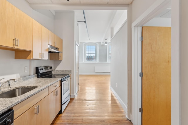 kitchen with stainless steel electric stove, light brown cabinetry, a sink, under cabinet range hood, and dishwashing machine