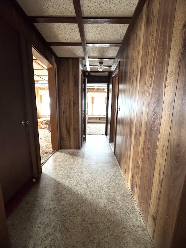 143 Main St, Sangerville, ME 04479 - hall with wood walls and carpet floors