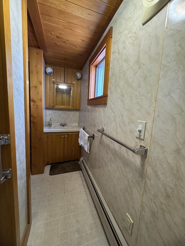 143 Main St, Sangerville, ME 04479 - bathroom featuring wooden ceiling and vanity
