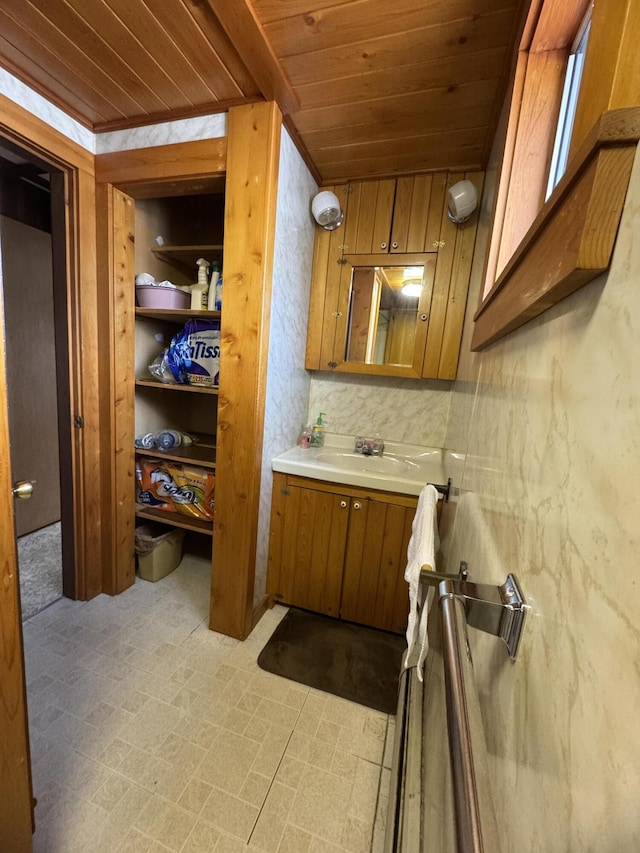 143 Main St, Sangerville, ME 04479 - bathroom with wood ceiling and vanity