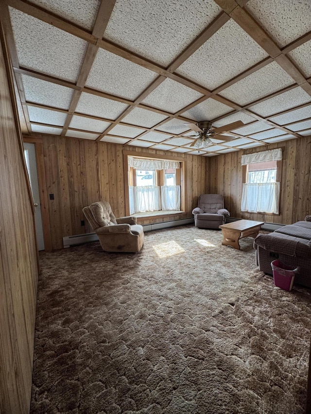 143 Main St, Sangerville, ME 04479 - living room with coffered ceiling, wooden walls, a baseboard radiator, and ceiling fan