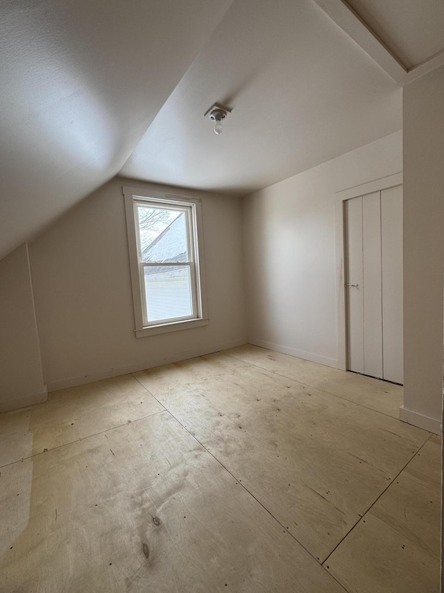 143 Main St, Sangerville, ME 04479 - additional living space featuring vaulted ceiling