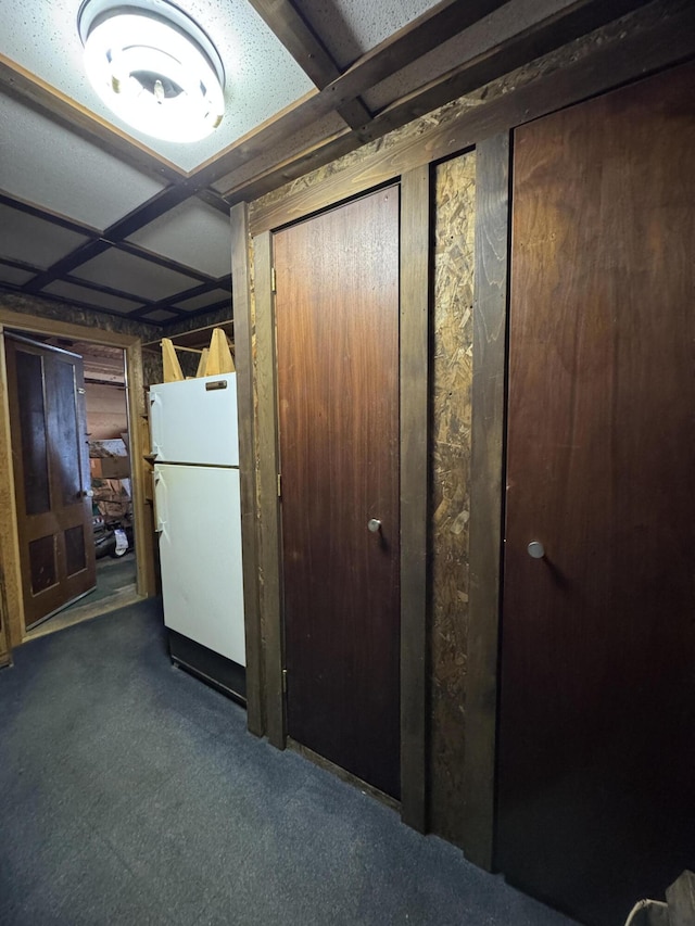 143 Main St, Sangerville, ME 04479 - below grade area featuring freestanding refrigerator and carpet flooring