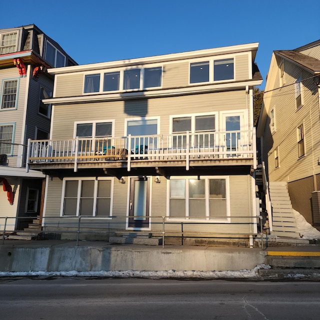 view of front of home featuring stairs