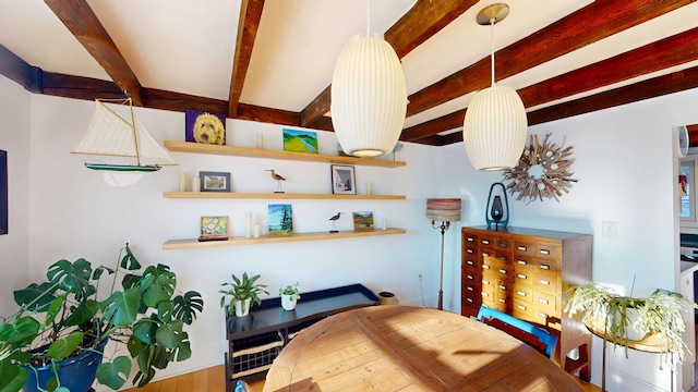 bedroom with beam ceiling