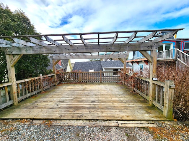 wooden deck with a pergola