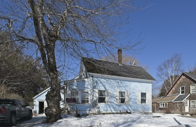 view of front of property with a chimney