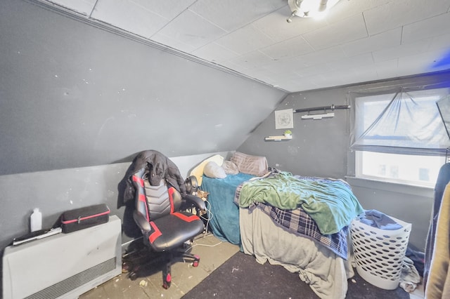 bedroom featuring vaulted ceiling