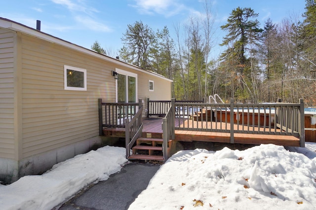 view of snow covered deck