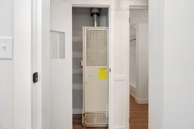 utility room featuring a heating unit