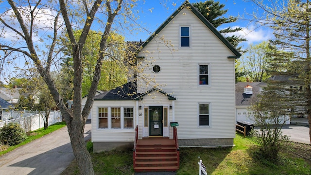 70 Savage St, Bangor, ME 04401 - view of front of property featuring fence and concrete driveway