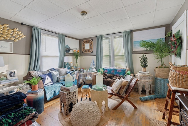 sunroom featuring a paneled ceiling