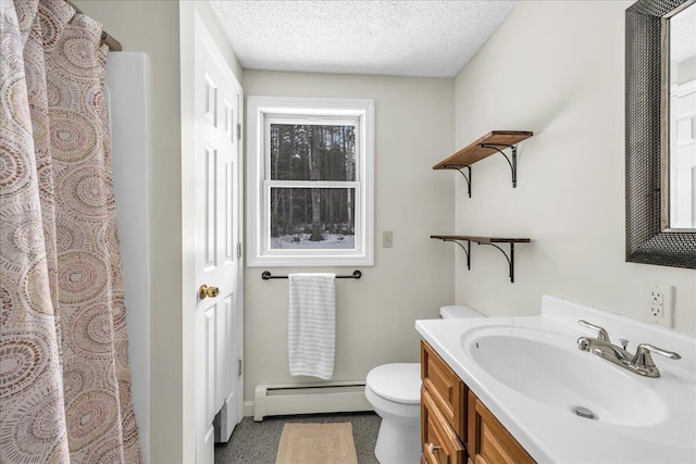 bathroom featuring toilet, curtained shower, a textured ceiling, vanity, and a baseboard heating unit