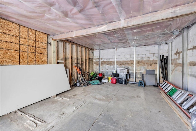 garage featuring concrete block wall