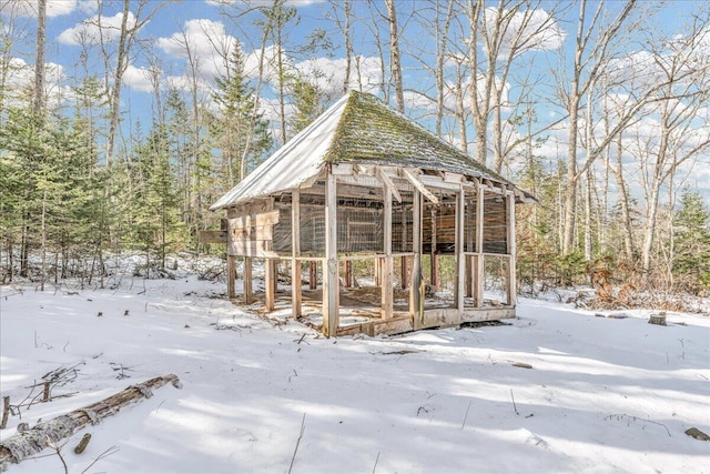 view of community featuring an outdoor structure