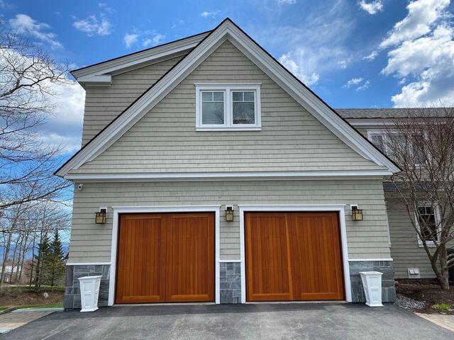 garage featuring aphalt driveway