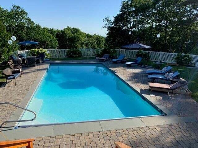 view of swimming pool with a patio, a fenced backyard, and a fenced in pool