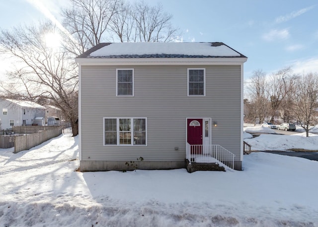 view of front of house with fence