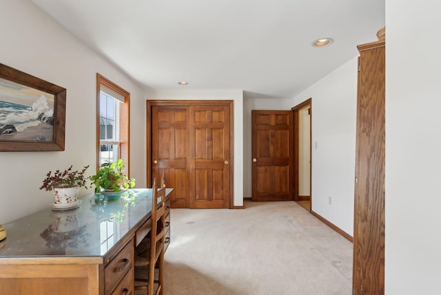 office with recessed lighting, baseboards, and light carpet