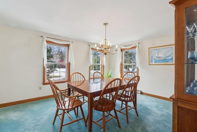 carpeted dining room with baseboards and a notable chandelier