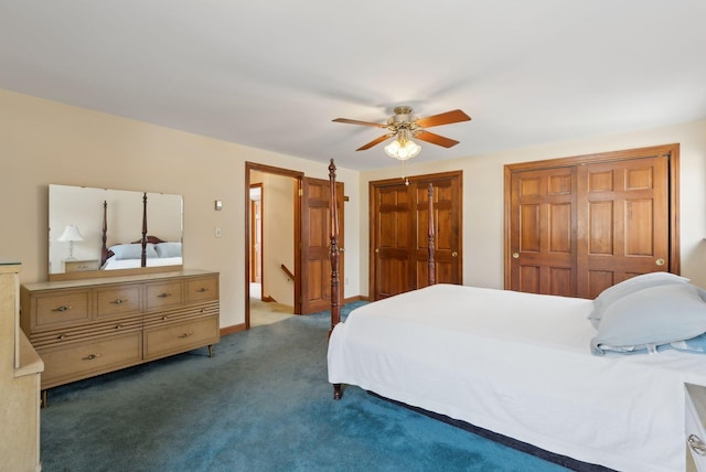 bedroom featuring carpet, two closets, and ceiling fan