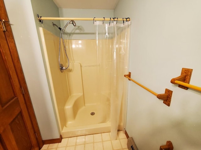 full bathroom with a shower stall