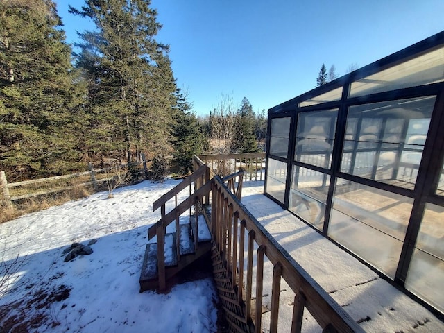 view of snow covered deck