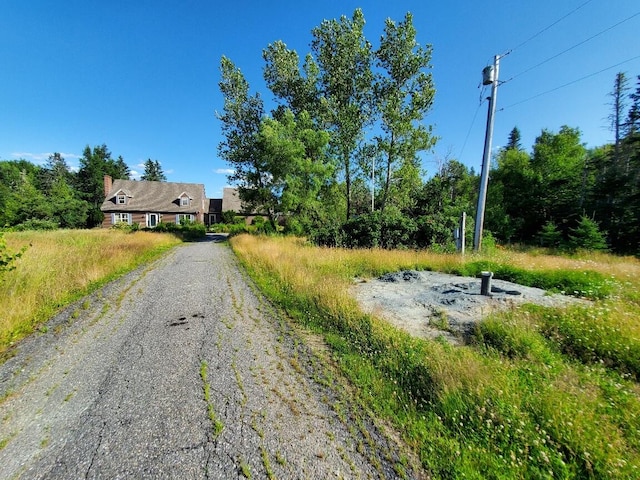 view of road featuring driveway