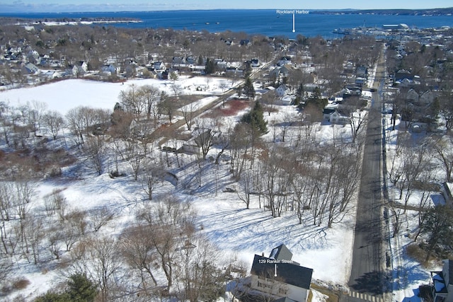 snowy aerial view featuring a residential view