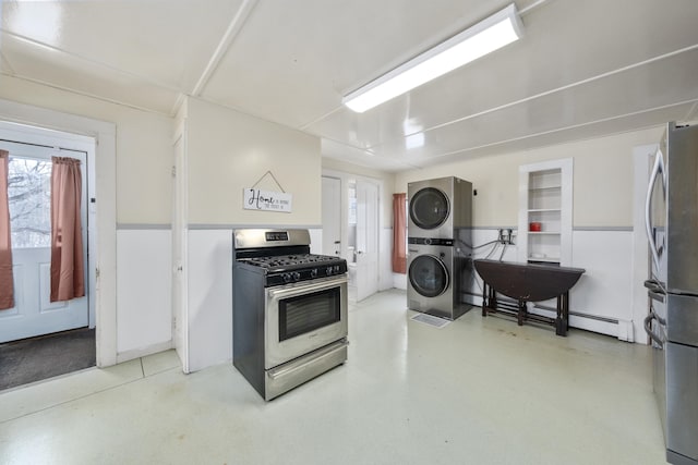 kitchen with stacked washing maching and dryer and appliances with stainless steel finishes