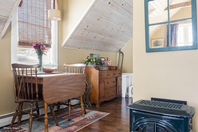 dining space with a baseboard radiator, wood ceiling, vaulted ceiling, and dark wood-style flooring