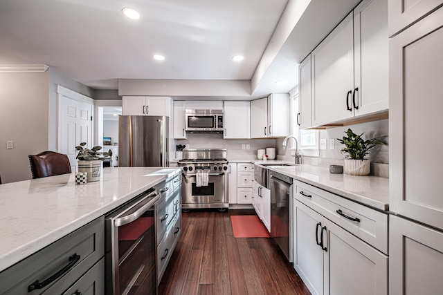 kitchen with wine cooler, stainless steel appliances, dark wood-type flooring, white cabinetry, and light stone countertops