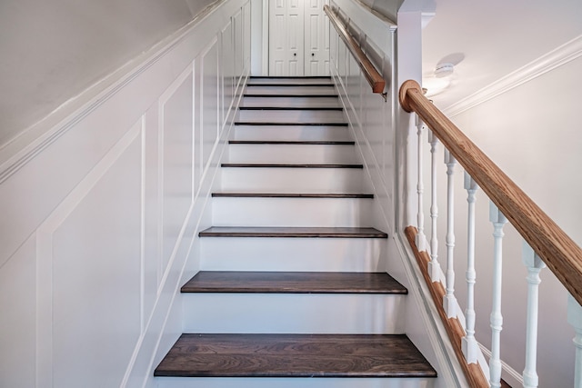 stairs with crown molding