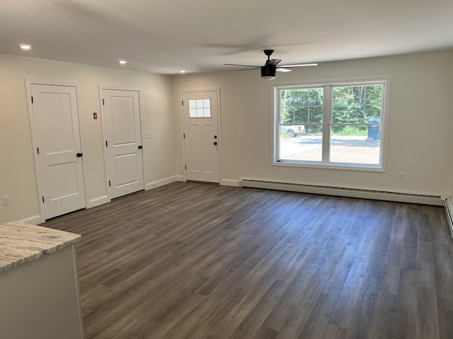 entryway with a baseboard heating unit, recessed lighting, baseboards, ceiling fan, and dark wood-style flooring