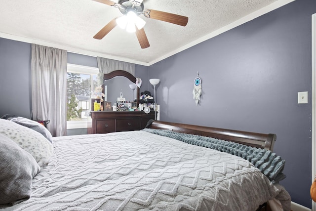 bedroom featuring ornamental molding, ceiling fan, and a textured ceiling