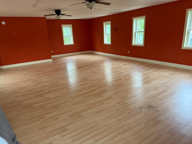 373 Pond Rd, Lewiston, ME 04240 - spare room featuring plenty of natural light, light wood-style flooring, and ceiling fan
