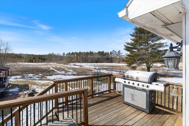 view of snow covered deck