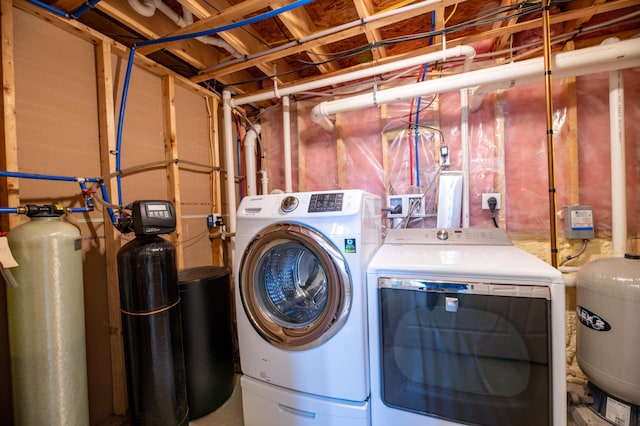 laundry room featuring washer and clothes dryer and laundry area