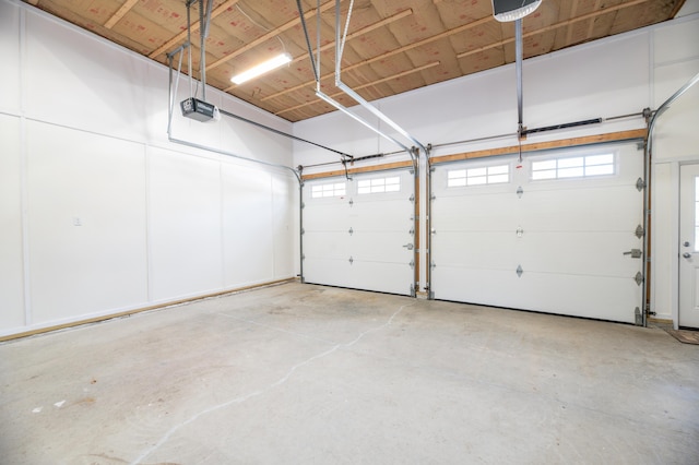 garage featuring a garage door opener