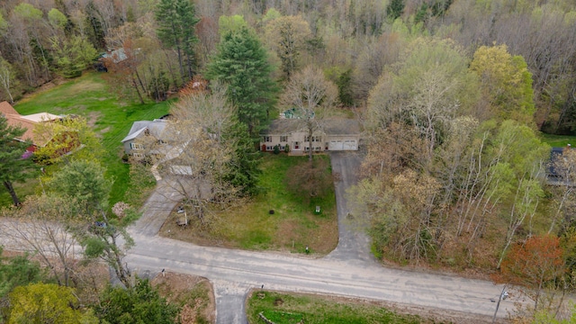 aerial view of property's location with a forest