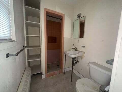 bathroom featuring toilet